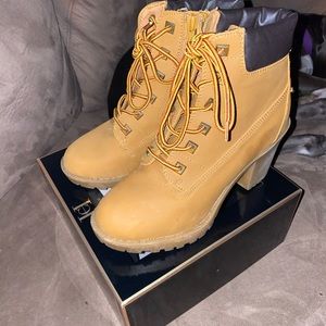 Kiana Lace up wedge work boot.
